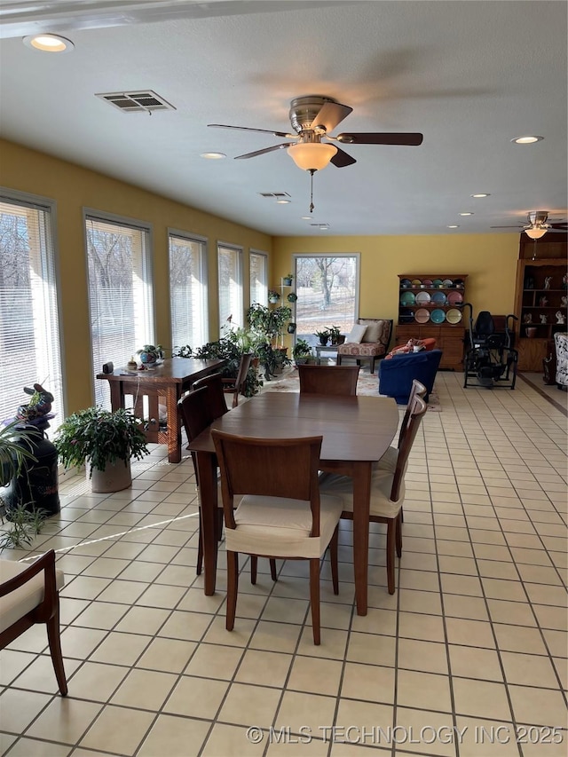 dining room with recessed lighting, visible vents, a ceiling fan, and light tile patterned flooring