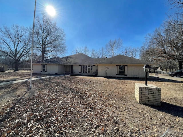 view of front of property with brick siding