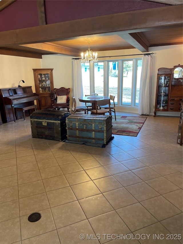 living area featuring a chandelier, a raised ceiling, beam ceiling, and tile patterned floors