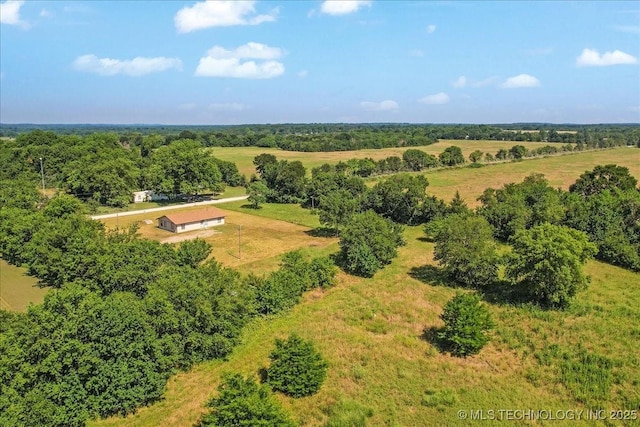 birds eye view of property with a rural view