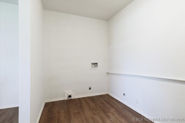 clothes washing area with washer hookup, electric dryer hookup, wood finished floors, laundry area, and baseboards