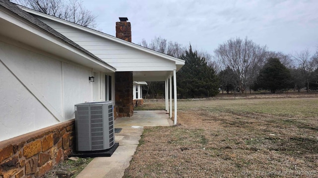 view of yard featuring central AC unit