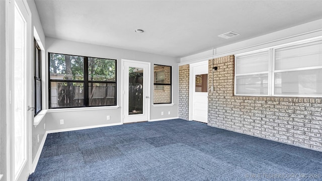 413 NW 15 NW, Ardmore, OK 73401 - unfurnished sunroom featuring visible vents