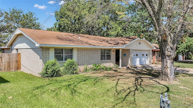 single story home featuring a garage, brick siding, fence, driveway, and a front yard