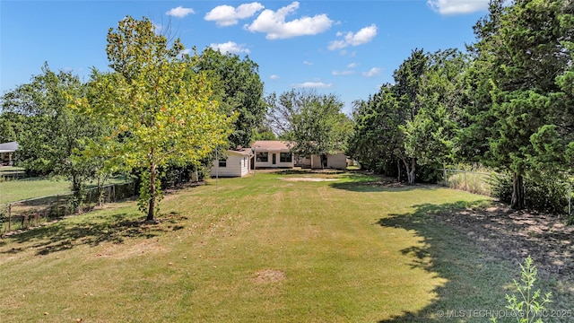 view of yard featuring fence