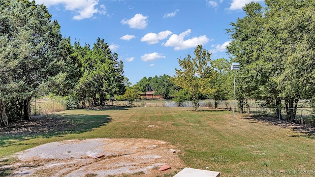 view of yard with fence