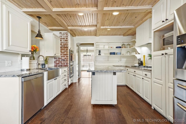 kitchen with stainless steel appliances, wooden ceiling, and white cabinetry