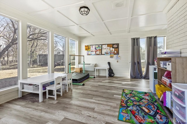 sunroom / solarium with coffered ceiling and beamed ceiling