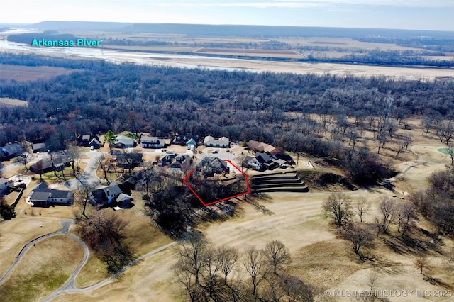 aerial view with a wooded view