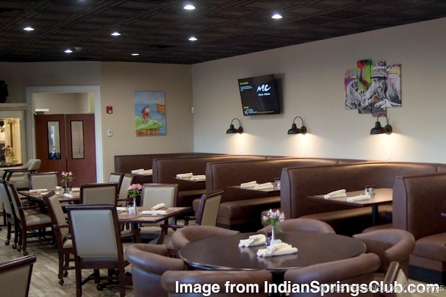 cinema featuring recessed lighting and wood finished floors