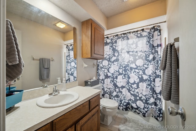 bathroom featuring toilet, tile patterned flooring, a textured ceiling, vanity, and a shower with curtain