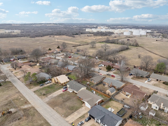 drone / aerial view with a residential view and a rural view