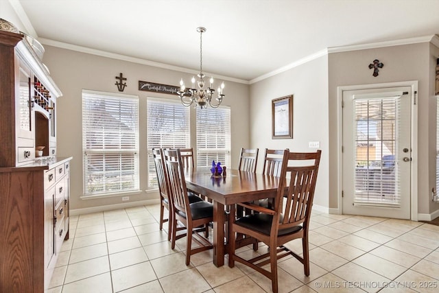 dining area with ornamental molding, a wealth of natural light, an inviting chandelier, and light tile patterned floors