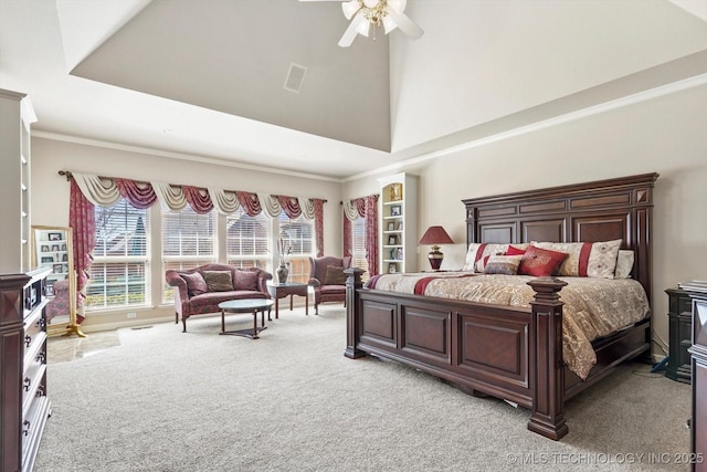 bedroom featuring light carpet, visible vents, ceiling fan, a high ceiling, and crown molding