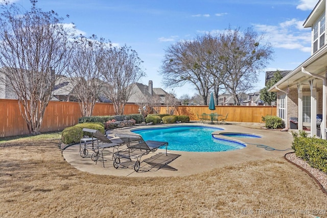 view of pool featuring a patio area, a fenced backyard, a fenced in pool, and an in ground hot tub