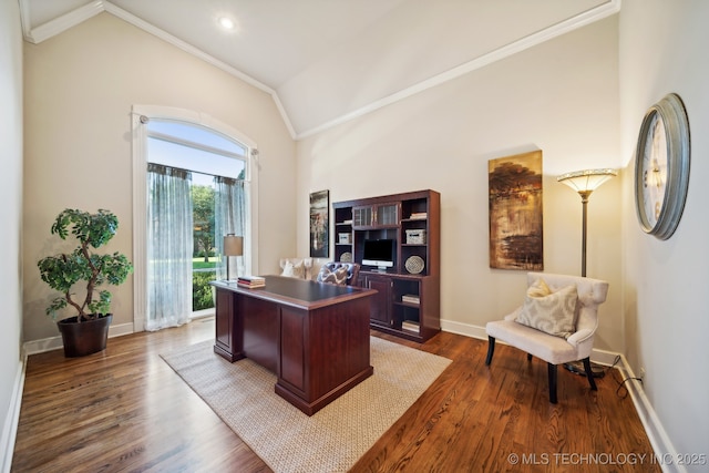 office with vaulted ceiling, ornamental molding, dark wood-type flooring, and baseboards