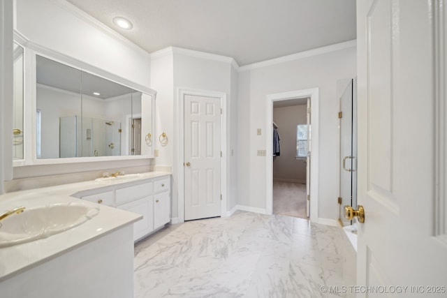 bathroom with a stall shower, baseboards, marble finish floor, crown molding, and vanity