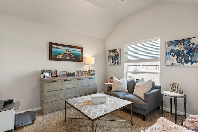 carpeted living room featuring vaulted ceiling and baseboards