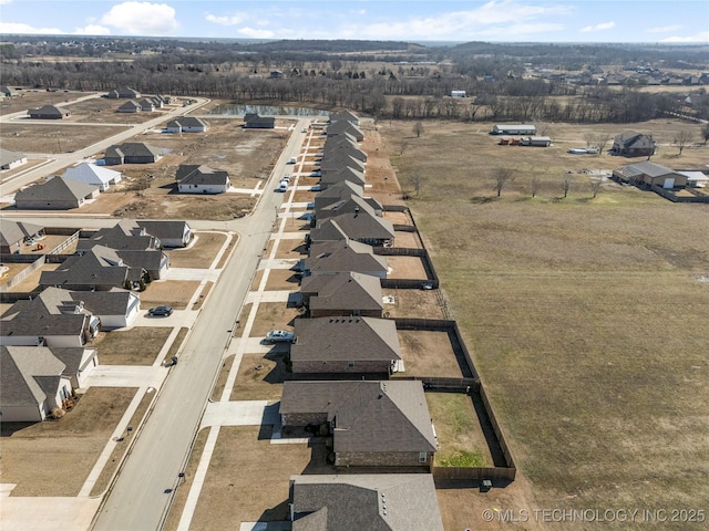 birds eye view of property featuring a rural view