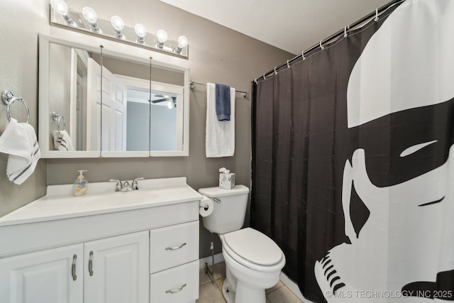 bathroom featuring a shower with curtain, tile patterned flooring, vanity, and toilet