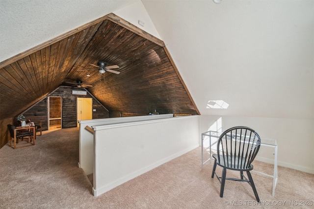 bonus room with lofted ceiling, carpet floors, wood ceiling, and baseboards