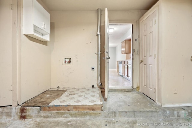 interior space featuring hookup for a washing machine, hookup for an electric dryer, and cabinet space