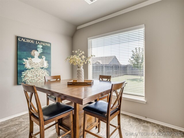 dining area featuring visible vents and baseboards