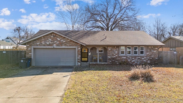 ranch-style home with an attached garage, fence, concrete driveway, and brick siding