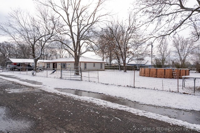 view of front of home with fence