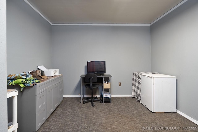 office space featuring crown molding, dark colored carpet, and baseboards