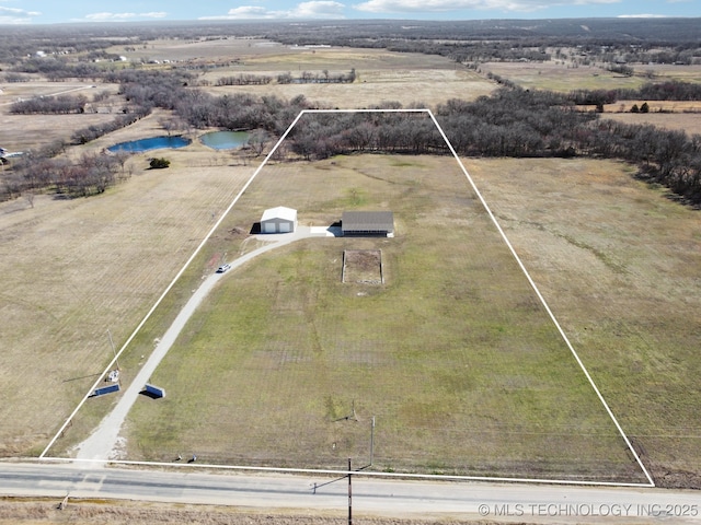 2374 N 205th Rd, Beggs, OK 74421 - overview of rural landscape with property boundaries highlighted and a large body of water