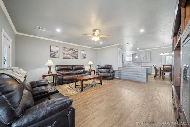 2374 N 205th Rd, Beggs, OK 74421 - living room with ceiling fan, light wood-type flooring, crown molding, and recessed lighting