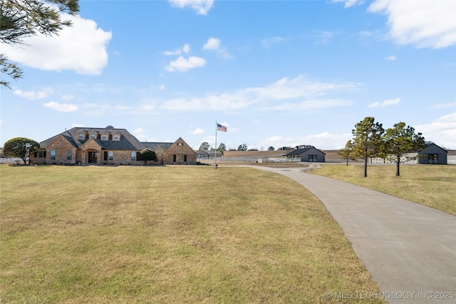 view of front of house with a front lawn