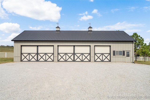 detached garage with fence