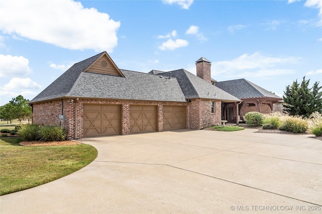 view of front facade featuring driveway, an attached garage, roof with shingles, and brick siding