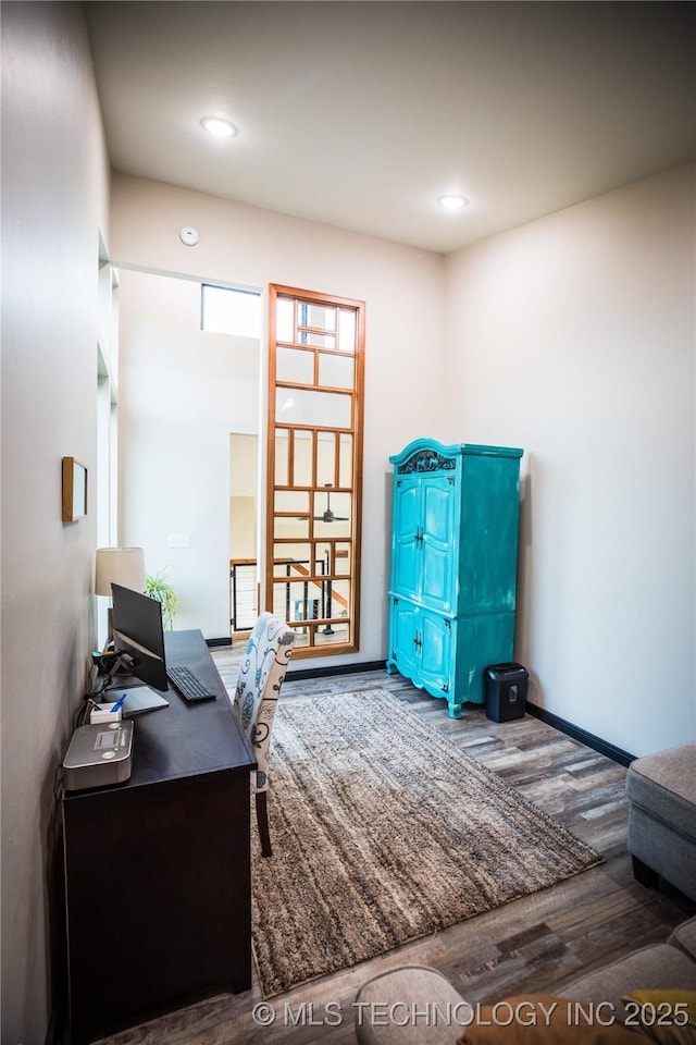 office featuring wood finished floors and recessed lighting