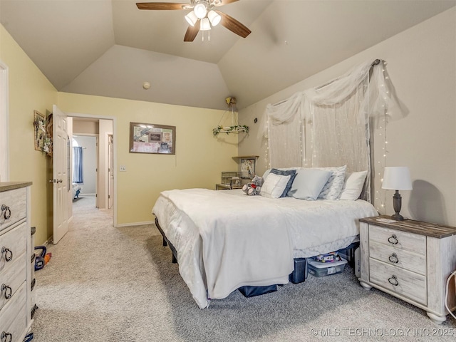 bedroom featuring a ceiling fan, light colored carpet, vaulted ceiling, and baseboards