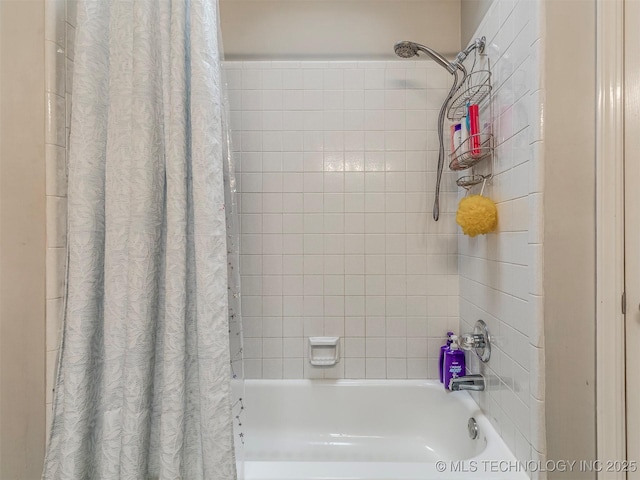 bathroom featuring shower / bath combo