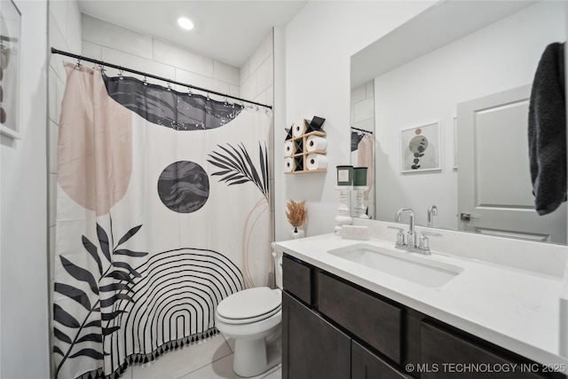 bathroom with a shower with shower curtain, vanity, toilet, and tile patterned floors