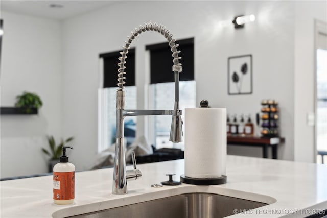 details with light countertops and a sink