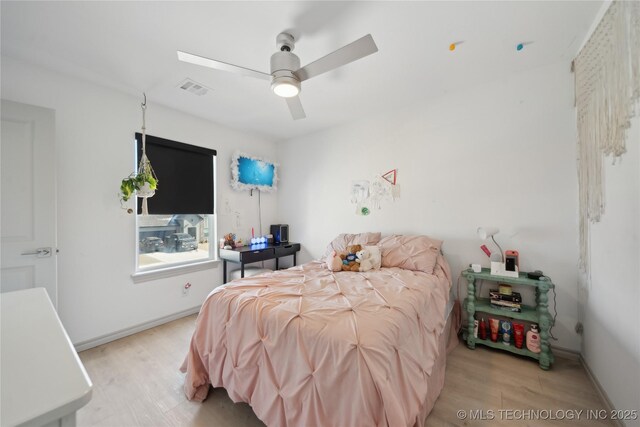 4632 S Chestnut Ave, Broken Arrow, OK 74011 - bedroom featuring light wood-style floors, baseboards, and a ceiling fan