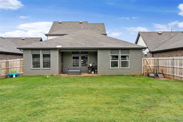 4632 S Chestnut Ave, Broken Arrow, OK 74011 - back of property featuring roof with shingles, a patio area, and brick siding