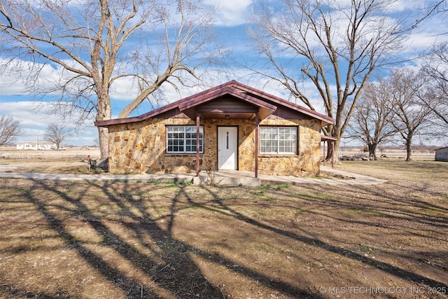 view of front facade with stone siding