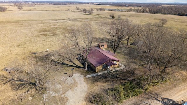 birds eye view of property featuring a rural view