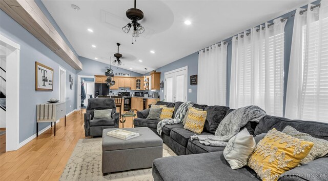 36953 US Highway 70, Bennington, OK 74723 - living area with vaulted ceiling, ceiling fan, light wood-style floors, recessed lighting, and baseboards
