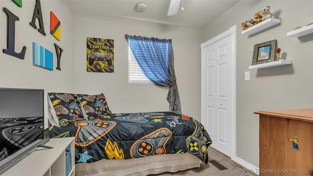 36953 US Highway 70, Bennington, OK 74723 - carpeted bedroom with a ceiling fan and baseboards