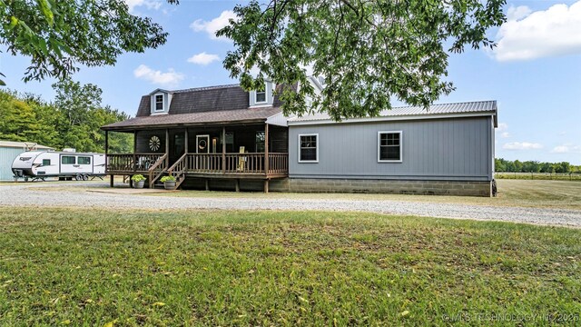 36953 US Highway 70, Bennington, OK 74723 - view of front of home featuring a front yard and a porch