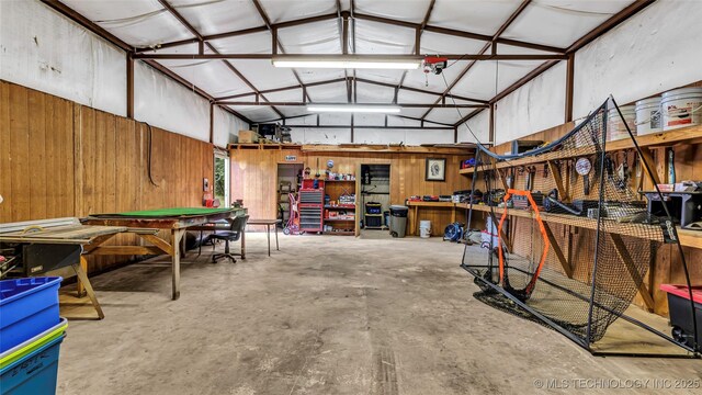 36953 US Highway 70, Bennington, OK 74723 - garage featuring wood walls and a workshop area