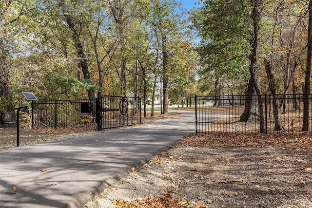 view of gate featuring fence