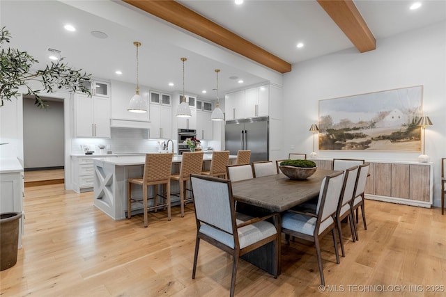 dining room featuring visible vents, recessed lighting, beam ceiling, and light wood-style floors